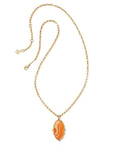 An icon, framed by heritage detailing inspired by traditional kilim motifs. The Baroque Ella Vintage Gold Long Pendant Necklace in Orange Banded Agate is a trend-forward design that makes a bold statement. 

 This necklace is a part of Yellow Rose by Kendra Scott—a collection that celebrates the American Southwest with Kendra Scott staples alongside select curated jewelry pieces and accessories. Kilim Motifs, Sold Out Sign, Traditional Kilim, Ranch Life, American Southwest, Long Pendant Necklace, Banded Agate, Long Pendant, Brass Material