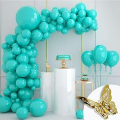 a bunch of balloons that are in the shape of a number one on a table