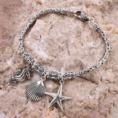 The Bali Legacy sterling silver sea creature charm bracelet is a beautifully crafted piece inspired by the ocean's enchanting theme. This bracelet features intricate sea creature charms, including a seahorse, shell, and starfish, each symbolizing stability. Handcrafted by skilled artisans, it exemplifies the finest Balinese artistry, showcasing timeless elegance and classic style. The bracelet is made from durable and affordable sterling silver, ensuring long-lasting wear. It is equipped with a lobster claw clasp for easy and comfortable wear.

 



Details

 



Sterling silver bracelet for women
Inspired by the ocean theme, symbolizing stability
Features sea creature charms, including seahorse, shell, and starfish
Handcrafted by skilled artisans
Emblematic of the finest Balinese artistr Silver Bracelet For Women, Silver Sea, Silver Bracelets For Women, By The Ocean, Ocean Theme, Sea Creature, Ocean Themes, Bracelet For Women, Sterling Silver Bracelet