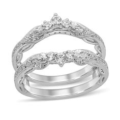 three piece wedding ring set with diamond accents