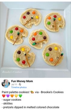 some cookies with candy on them are sitting on a white plate and the words fun money mom is in front of it