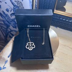 24 Inch Chanel With Original Box. Unique And Rare Chanel Necklace In Very Good Condition. Gold, 40 Pearls, 14 Black Stones, One Center Pearl And Cc Logo Luxury Silver Jewelry With Original Box, Luxury Jewelry With Flower Charm For Formal Occasions, Luxury Formal Jewelry With Flower Charm, Luxury Flower Charm Necklace For Wedding, Luxury Necklace With Flower Charm For Anniversary, Luxury Flower-shaped Necklaces For Anniversary, Luxury Flower Necklaces For Anniversary, Luxury Flower Necklace For Anniversary, Luxury Flower-shaped Anniversary Necklaces