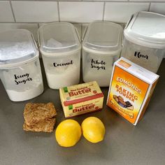 some lemons, crackers and other food items on a counter