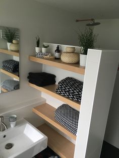 the bathroom is clean and ready to be used as a place for someone to relax