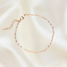 Wear your heart on your sleeve with our Soulmate Chain Bracelet. This beautiful piece features a chain of dainty intertwined hearts. Its subtlety is absolutely breathtaking and is bound to lead you to your soulmate. Our line of stainless steel bracelets are made to be water and tarnish resistant. Wear this bracelet and feel confident wherever you go without having to worry about upkeep! Material: Stainless steel with cubic zirconia stones Hypoallergenic 6" with 1.5" extension Shop our entire Sta Intertwined Hearts, Silver Chain Bracelet, Gold Bracelet Chain, Stainless Steel Bracelet, Soulmate, Chain Bracelet, Cubic Zirconia, Gold Necklace, Chain