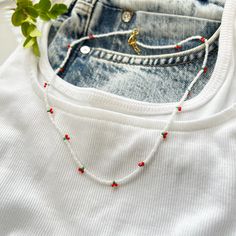 ♥This handmade cherry beaded choker necklace made with white beads and cherry beads or blue beads and cherry beads in between. This minimalist beaded choker is great for everyday outfit or it is a perfect fit for your beach outfits and summer outfits. ♥You can layer the necklaces if you like. ♥Design is available in 2 colors: Blue and White ♥It has a lobster clasp closure and an extension chain allowing for easy adjustability and remove.  ♥It is ready to ship immediately. ♥Necklace Length: 16 in Cherry Beaded Necklace, Cherry Charm, Cherry Necklace, Seed Bead Choker, White Beaded Necklaces, Necklace Everyday, Bead Choker, Summer Necklace, White Necklace