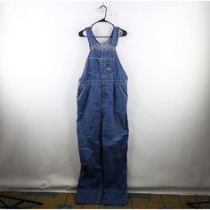 Vtg 50s 60s OshKosh B'Gosh Mens 38x34 Union Made Sanforized Vestbak Overalls USA Mens Overalls Loose threads front top. Blemishes front both legs. Loose seam right pocket, tear right side pocket. Distressed and faded. Color faded . USA made Mens size 38x34 Measurements are: 21.5 inches across the waist laid flat 19.5 inche underarm to underarm 34 inch inseam 65 inches top to bottom 10.25 inch leg opening Cotton Blue US Shipping is FREE and International is Calculated Check out my other items in Overalls Loose, Vintage Oshkosh, Cotton Overalls, Mens Overalls, Union Made, Blue Check, Denim Overalls, Side Pocket, Mens Jeans