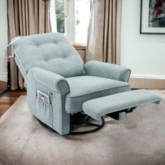 a blue recliner chair sitting on top of a carpeted floor next to a window