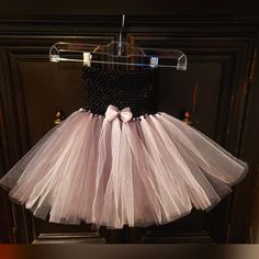 New! Handmade Crochet Tube Top Lt. Pink, Ivory & Black Tulle Tutu Dress. This Little Girls Crochet Tube Top Atulle Has Lt. Pink, Ivory & Black Tulle. Never Woren. Size: 12mth-2t Celebrate Your Little Girl With This Black Top With Grey And Lt Pink Crocheted Tutu Dress. Artistically Designed To Perfection, It Features A Soft Crocheted Tube Top With A Layered Tulle Tutu Attached Beneath. Black, Grey And Lt Pink Tulle Are Expertly Stylized To Create An Ombre Effect That Adds An Ethereal Vibrancy. Wh Grey Crochet Top, Girls Red Velvet Dress, Crochet Tube, Crochet Tube Top, Floral Spaghetti Strap Dress, Blue Gingham Dress, Grey Crochet, Tulle Tutu Dress, Eyelet Lace Dress