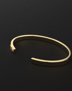 Whether you're looking for a traditional look or something newer, this cuff for men is a timeless piece of jewelry that you can wear for official events and everyday life.When choosing a men's jewel, ensure the style and material match your outfit. Choosing a comfortable men's bracelet is essential in ensuring it fits perfectly.Their exteriors and minimal shape allow the precious metal plating to shine through. You can wear them alone or with other minimal accessories with similar tones. This is Classic Adjustable Gold Bracelet With Polished Finish, Timeless Adjustable Gold Bracelet With Polished Finish, Yellow Gold Open Cuff Bangle For Formal Occasions, Formal Yellow Gold Open Cuff Bangle, Modern Cuff Bracelets With Polished Finish, Luxury Polished Cuff Bracelet, Adjustable Cuff Jewelry, Elegant Formal Bracelet Wristband, Classic Adjustable Jubilee Bracelet Wristband