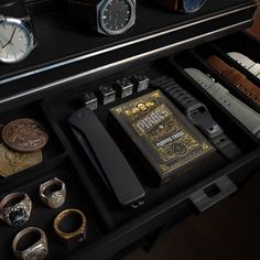 Why collect nice watches without a proper watch box to display them? The hinged acrylic cover on this wooden mens watch box keeps the dust off your watches while providing a fantastic 360-degree view of 7 of your best timepieces. The large wooden drawer beneath provides storage for your everyday accessories  This watch organizer for men comes in a smooth wood finish. The Collector Pro includes an acrylic case with a hinge for easier access to your watches and vegan leather padding for extra prot Black Watch Accessories With Day-date Display, Luxury Black Watch Accessories With Analog Display, Functional Black Watch Accessories With Digital Display, Cologne Organizer For Men, Mens Watch Holder Organizers, Luxury Men's Watch Accessories With Day-date Display, Tactical Gear Storage, Watch Box For Men, Mens Accessories Vintage