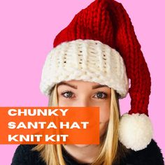 a woman wearing a knitted santa hat with the words chunk santa hat knitting kit