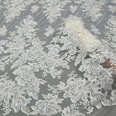 "Beaded Embroidery Lace Fabric . It's perfect for weddings, bridal parties, and any events. Shop our large inventory of bridal fabrics. ☆PRODUCT DESCRIPTION : The fabric width is approximately 51\" (130 cm) Wide. Length: 1 Yard, If you buy more than 1 yard, I will send you a whole piece of fabric uncut. Color: Off-White Material: Polyester Yarn, Off-White Beads, Transparent Sequin. 8012 ☆ PURCHASING INFORMATION: This fabric is sold by the yard and each Qty you enter will represent 1 yard of fabr Tulle Wedding Dress With Lace Work, Embellished White Lace For Wedding, Wedding Tulle Lace Fabric With Pearl Embroidery, Lace Wedding Dress With Pearl Embroidery For Bride, Wedding Tulle Fabric With Floral Embroidery, Wedding Tulle Fabric With Delicate Lace, Wedding Lace Tulle Fabric, Wedding Tulle Fabric With Lace Work, Wedding Tulle Fabric With Pearl Embroidery