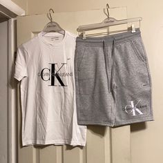 Men’s Calvin Klein Jeans Tee/Shorts 2 Separate Pieces Being Sold As A Set Never Worn Calvin Klein Shirts Men, Casual Calvin Klein Bottoms With Built-in Shorts, Calvin Klein Graphic T-shirt For Streetwear, Calvin Klein Casual Graphic T-shirt, Poses Aesthetic, Calvin Klein Graphic Print Relaxed Fit T-shirt, Athletic Men, Calvin Klein Men, Jeans White