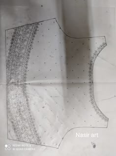 an image of a piece of paper that has been cut out to look like a dress