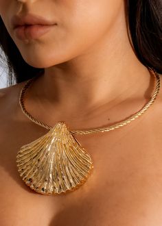 Dive into timeless elegance with the "Tides Shell Necklace," a piece that beautifully captures the essence of coastal luxury. Featuring a stunning gold-toned shell pendant, this necklace brings the serene beauty of the ocean to your wardrobe. The twisted rope chain adds a touch of nautical charm, while the lustrous finish ensures you’ll stand out whether you’re at a beachside soirée or a chic city event. Model measurements, height and weight located in size chart Order ships within 24-48 hours or sooner (Monday-Friday) Coastal Luxury, Diva Boutique, Long Crop Top, Lace Cutout, Concert Fits, Leather Floral, Shell Necklace, Tall Girl, Boutique Online