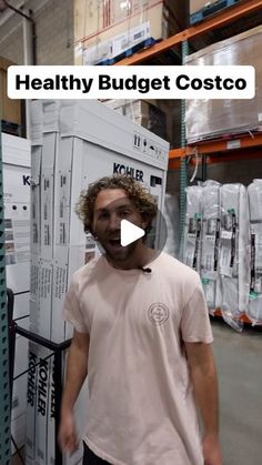 a man standing in front of a white box with the words healthy budget costco written on it