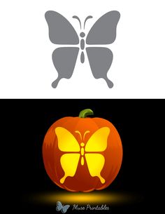 an orange pumpkin with a butterfly on it