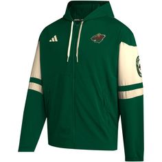 Represent your Minnesota Wild pride with the men's adidas green Minnesota Wild full-zip hoodie. This lightweight hoodie is perfect for mild temperatures, featuring embroidered fabric applique and heat-sealed graphics that proudly display your unwavering support for the Minnesota Wild. The two front zippered pockets provide convenient storage for your essentials, while the locker loop inside the collar and drawstring hood add functionality and comfort. Whether you're cheering from the stands or s Adidas Green Winter Track Jacket, Green Adidas Winter Track Jacket, Adidas Cotton Track Jacket For Sports, Green Adidas Sweatshirt For Winter, Winter Adidas Green Track Jacket, Green Fan Apparel Hoodie, Green Cotton Sporty Track Jacket, Cotton Track Jacket With Drawstring Hood For Sports, Green Hooded Fan Apparel Hoodie