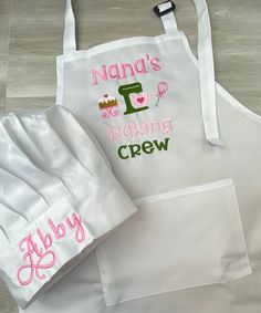 two aprons and an apron with the words nanna's baking crew on them