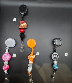 Add a touch of Bead-azzle to your everyday essentials! My handmade bedazzled badge reels are perfect for adding some flair to your work attire or making a statement at your next event. My collection features a variety of vibrant colors, dazzling rhinestones, and unique designs, ensuring there's something for everyone. Whether you're a nurse, teacher, office professional, or simply love accessorizing, our bedazzled badge reels are both functional and fashionable. They make fantastic gifts for colleagues, friends, or anyone who loves a bit of sparkle in their life. Multicolor Beaded Badge Reel As Gift, Multicolor Retractable Badge Reel For Gift, Cheap Black Retractable Badge Reel, Adjustable Retractable Multicolor Badge Reel, Customizable Novelty Multicolor Badge Reel, Gifts For Colleagues, Work Attire, Fantastic Gifts, Badge Reel