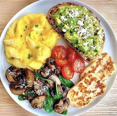 a white plate topped with different types of food