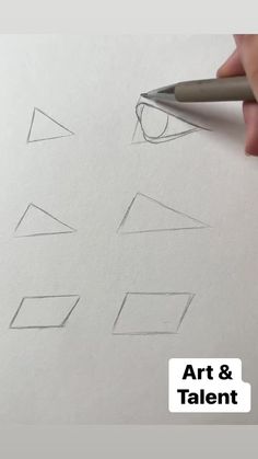 someone is drawing shapes on paper with a pencil