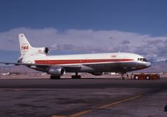 a large jetliner sitting on top of an airport tarmac