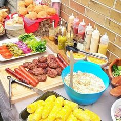 the food is being served on the table for people to eat and drink from them