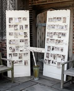 two old doors with pictures on them and a trash can in front of them,