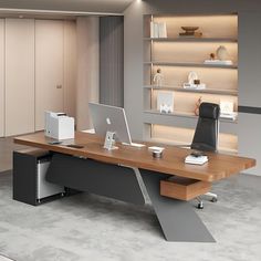 an office desk with a laptop on it