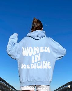 Stay cozy and fashionable with our 'Women in Medicine' hoodie. Featuring a retro back print, this hoodie celebrates the accomplishments of female medical professionals. Perfect for aspiring doctors, nurses and healthcare professionals. #WomenInMedicine #MedicalProfessionals #Hoodie #Fashion #GenderEquality #STEM #ScienceFashion #Healthcare #NurseLife #DoctorLife #WomenInSTEM #Inspiration #Empowerment #AthleticWear #FitnessFashion #Athleisure #Vintage #Throwback #EverydayWear #CasualStyle Quote Hoodies, Vsco Hoodie, Positive Hoodie, Aesthetic Sweatshirt, Sweatshirt Aesthetic, Zodiac Shirts, Hoodie Aesthetic, Sweatshirt Oversized, Aesthetic Hoodie