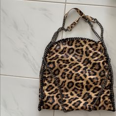 New Cheetah Shoulder Bag Brand New Never Used Chic Everyday Leopard Print Shoulder Bag, Chic Leopard Print Bag With Double Handles, Chic Leopard Print Tote Shoulder Bag, Chic Double Handle Bag In Leopard Print, Chic Double Handle Leopard Print Bags, Chic Leopard Print On-the-go Bag, Leopard Print Pouch Shoulder Bag For Daily Use, Leopard Print Shoulder Bag With Removable Pouch For Shopping, Brown Top Handle Bag With Chain Strap