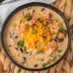 a bowl filled with chicken and black bean soup