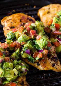 grilled chicken with guacamole salsa on top