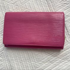 Louis Vuitton Fuchsia Epi Wallet | Womens Leather Bi-Fold Aprox 6” W X 4” H Pre-Loved Good Condition Small Scratch On The Front And Minor Rub Marks Where The Dark Purple Interior Rubbed Against The Leather On The Inside Flap (See Photos) Very Cute Piece Dark Purple Interior, Purple Interior, Bags Louis Vuitton, Louis Vuitton Bags, Dark Purple, 4 H, Louis Vuitton Bag, Leather Women, Bag Lady