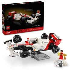 the lego race car is in its box and it's ready to be built