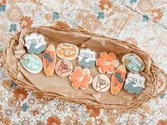 some decorated cookies in a wicker basket