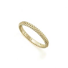 An 18k gold Caviar beaded stacking ring. Perfect to layer with other rings. Heirloom Yellow Gold Stackable Midi Rings, Stacked Yellow Gold Wedding Jewelry, Elegant Stacked Rings For Wedding, Elegant Stacked Wedding Rings, Stacked Yellow Gold Round Jewelry, Stacked Round Yellow Gold Jewelry, Stacked Yellow Gold Ring, Stacked 14k Yellow Gold Rings, Timeless Gold Stackable Rings With Halo