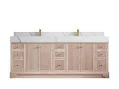 a bathroom vanity with two sinks and marble counter tops on the top, in light wood