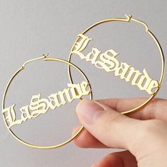 Lets make our lives more beautiful with custom/personalized items. This can bring you a lot of joy when you see your name or your loved once name on the item.  Having your personal touch on a piece of jewelry really makes a difference.  Item:-   Old English Name Earrings Hoop Diameter:- 30-40-50-60-70-80-90-100 MM Metal:- Stainless Steel Finished:- Platinum-Rose Gold-Gold We have make 2 different name on1pair Please Explain your Name & Font No. On Personalization Box. Like This-   Abdul   Font # Earrings Name, English Name, Letter Earrings, Name Earrings, Platinum Rose Gold, Initial Earrings, Earrings Bridesmaid, Earrings Hoop, Name Jewelry