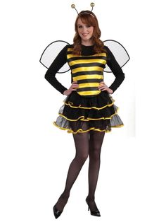 a woman in a bee costume posing for the camera