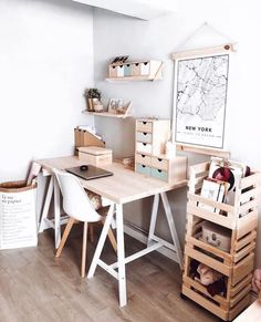 a room with a desk, chair and bookshelf