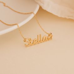 Give a meaningful gift to your child that they will wear every day with our Custom Kid’s Name Necklace. Both dainty and minimalist, this necklace can be personalized with any name and can even include cute symbols to make this jewelry piece more unique. Material: High-Quality Solid 925 Sterling Silver Finish: Sterling Silver ∙ 18K Gold ∙ Rose Gold Dimensions: Depending on your font choice, height sizes range from 3mm to 4mm lowercase SKU: HH-NH02F87 Adjustable Rose Gold Charm Necklace With Custom Name, Customizable Rose Gold Nameplate Charm Necklaces, Personalized Dainty Rose Gold Charm Necklaces, Personalized Dainty Rose Gold Charm Necklace, Customizable Rose Gold Dainty Charm Necklace, Customizable Dainty Rose Gold Necklace, Dainty Customizable Rose Gold Necklace, Delicate Rose Gold Sterling Silver Name Necklace, Dainty Name Charm Necklace For Everyday