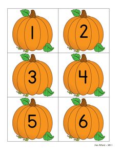 the pumpkins are arranged in four rows to make it look like they have numbers on them