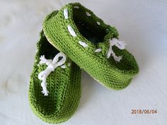 A pair of crochet toddler boat shoes with flip flop soles. Coastal Fashion