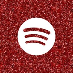 a red glittered background with a white spot in the middle that says spotify