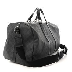 This is an authentic GUCCI GG Supreme Monogram Medium Carry-On Duffle Bag in Black and Grey. This stylish duffel is crafted of Gucci GG monogram coated canvas. The bag features rolled leather top handles, an optional black canvas shoulder strap with gunmetal links, luxurious leather side panels and trim. The top zipper that opens to a spacious black fabric interior with zipper and patch pockets. Gucci Travel, Mini Duffle Bag, Gg Monogram, Beauty Case, Monogram Bag, Black Canvas, Side Panels, Blue Bags, Luggage Tags