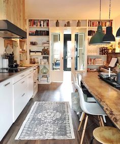 the kitchen is clean and ready to be used as a dining room or living area