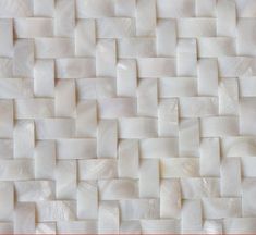 a close up view of a white woven material